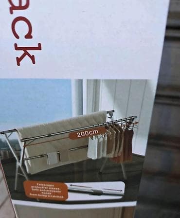 sušilica za veš: Stalak za sušenje veša sa teleskopskim šipkama. Stalak je dugačak 200 — 5