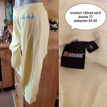 Donji deo: Žute trenerka 3/4 pantalone “Steam” – veličina S. - Dužina: 77 cm -