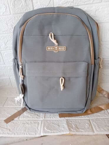 Sivi ranac MR. NID – moderan i praktičan za školu, posao ili