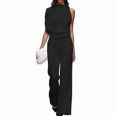 ✅Ženski crni kombinezon – elegancija minimalističkog kroja
✅2400 din