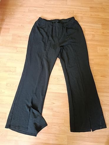 Crne ženske pantalone širokog kroja - Boja: crna - Kroj: ravne, blago — 1