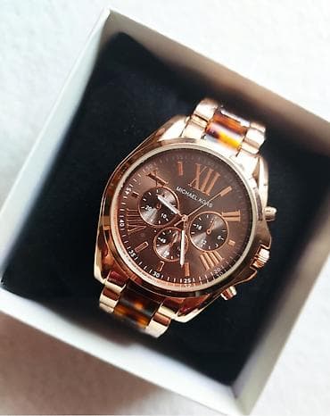 Fantastičan sat u braon boji . Brojčanik je prečnika 44 mm na lalafo.rs Fantastičan sat u braon boji . Brojčanik je prečnika 44 mm