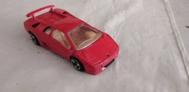 red dead redemption 2 pc cd: Burago Lamborghini Diablo 1:43 Italy naprslo pr.desno krilo — 1