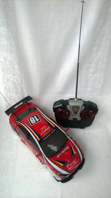 Na daljinski Mitsubishi ZX5,27 mHz,1:18 (25 cm), bez baterija(u auto