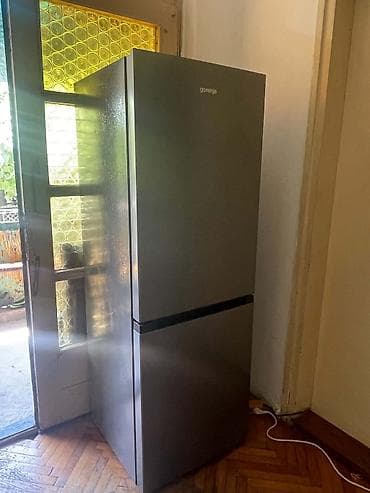 polovna masina za sudove: Gorenje kombinovani frižider sa zamrzivačem dole, inox/siva boja. - — 1