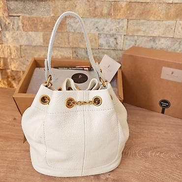 mona torbe polovne: Kožna torba-buket (bucket bag) u boji slonovače sa zlatnim detaljima — 2