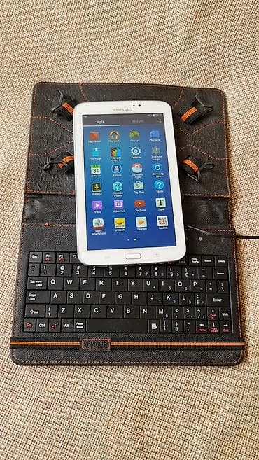 desktop ventilator: Kožna futrola sa ugrađenom žičnom tastaturom za tablet (oko 7–8 inča) — 10