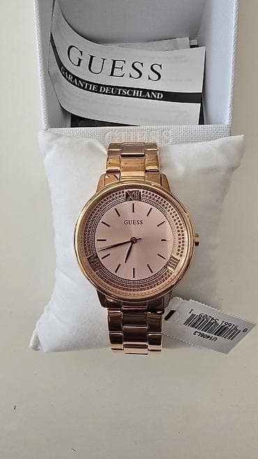 GUESS ženski ručni sat – rose gold - Kućište i narukvica od na lalafo.rs GUESS ženski ručni sat – rose gold - Kućište i narukvica od