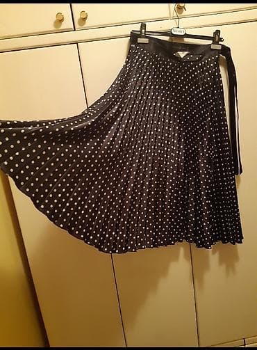 plisirani kombinezon: Plisirana suknja na tufne – Unichic Wurbam - Model: midi plisirana — 1