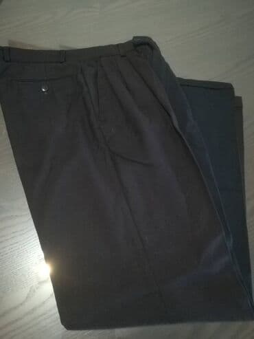 donji deo pidzame muski: Pantalone crne "Nicola*s" vel 104/46. Obim struka 72 cm, obim bokova — 4
