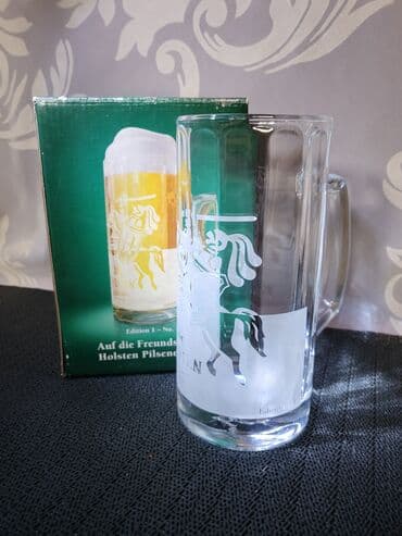 jelen pivo krigla: Nova krigla,vintaz Holsten Pilsner. Krigla nova,sve na njoj odsjaj od — 4
