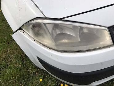 čamac za prihranu: DESNI FAR MEGAN 2 ZA RENAULT MEGANE — 1