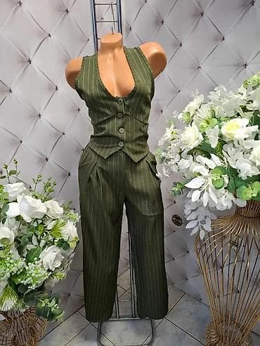 butik 13 kompleti: Ženski dvodelni komplet – prsluk + pantalone sa prugama - Model — 1