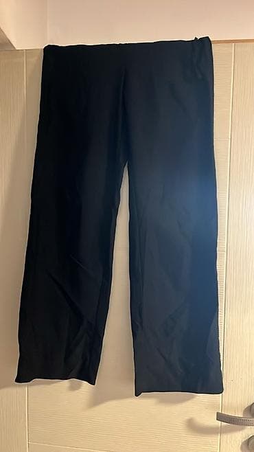 Crne široke pantalone ravnog kroja - Boja: klasična crna - Kroj na lalafo.rs Crne široke pantalone ravnog kroja - Boja: klasična crna - Kroj