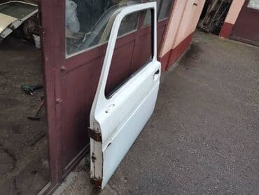 polovne letnje gume 215 55 r16: Dodatni opis Vrata leva Lada 21213,21214 Niva u beloj boji. Polovna — 3