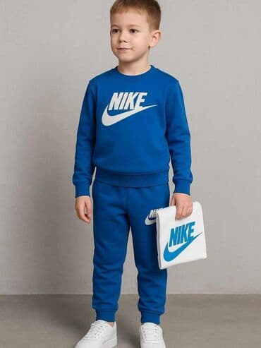 Komplet trenerke: Komplet dečije trenerke marke Nike. Sastoji se od dukserice dugih — 1