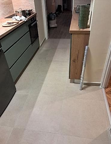 Postavljanje svih vrsta pločica na zid i na pod. Cena usluge za