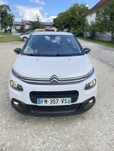 lidl kompresor za vazduh: Beli automobil marke Citroen C3 sa crnom maskom hladnjaka i crnim — 2
