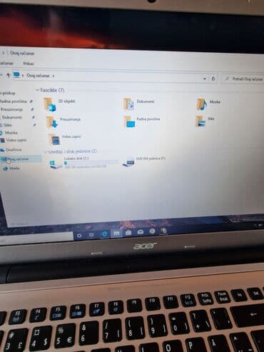 torbe za laptop carpisa: Acer laptop u srebrnoj boji, pogodan za svakodnevnu upotrebu. Tanak — 7