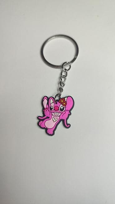 Privjesak za ključeve – gumeni crtani lik u ružičastoj boji -
