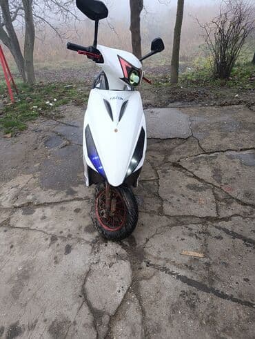 Električni skuter Fazon – gradski e‑skuter sa koferom Garancija Ide na lalafo.rs Električni skuter Fazon – gradski e‑skuter sa koferom Garancija Ide