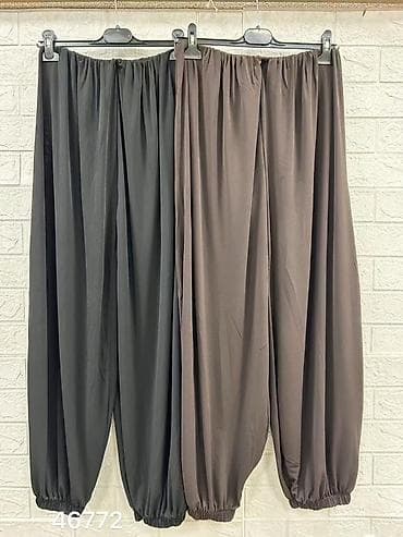 Pantalone, Farmerke, Šortsevi: Široke ženske pantalone od laganog, prozračnog šifona. Model sa — 2