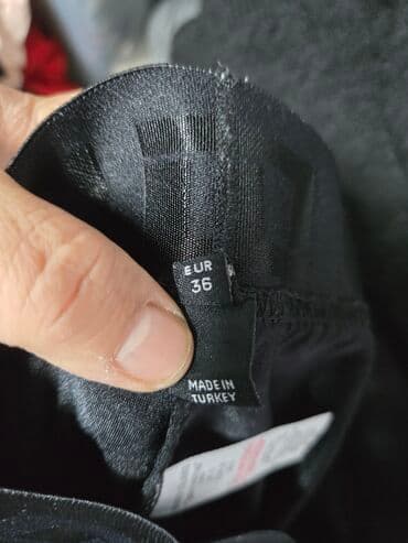 deichmann gumene čizme: Crne ženske pantalone od somota/velura sa elastičnim pojasom u bež — 3