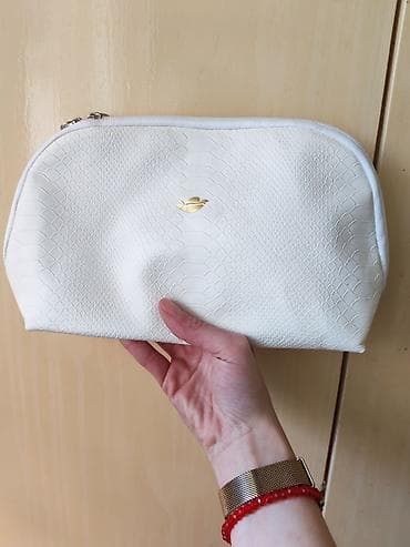 Elegantna bela kozmetička torbica sa teksturom imitacije zmijske kože