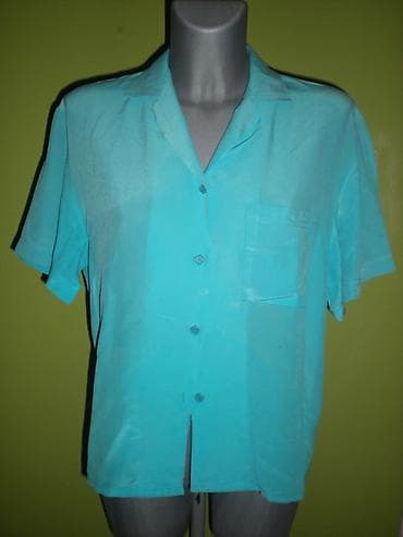 SVILENA BLUZA Vintage bluza od čiste svile. Boja je tirkizno plava na lalafo.rs SVILENA BLUZA Vintage bluza od čiste svile. Boja je tirkizno plava