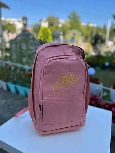 doca torbe nis: Rančevi sa štampom Nike motiva - Modeli: roze ranac sa žutim Nike — 1