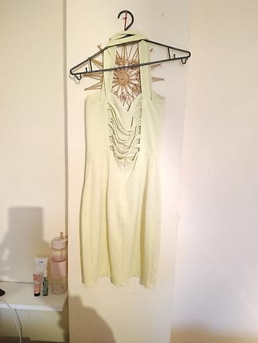 Elegantna ženska haljina bez rukava u svetložutoj (pastelnoj) boji