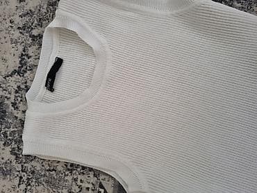 torbica koja trepce: Beli rebrasti ženski top bez rukava - Kroj: uski, bez rukava, okrugli — 2