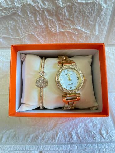 tommy hilfiger d: Narukvica i sat 
2500 din — 4
