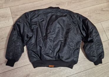 new yorker crna gora online: Crna bomber jakna (MA-1 stil) sa narandžastom postavom. - Materijal — 4