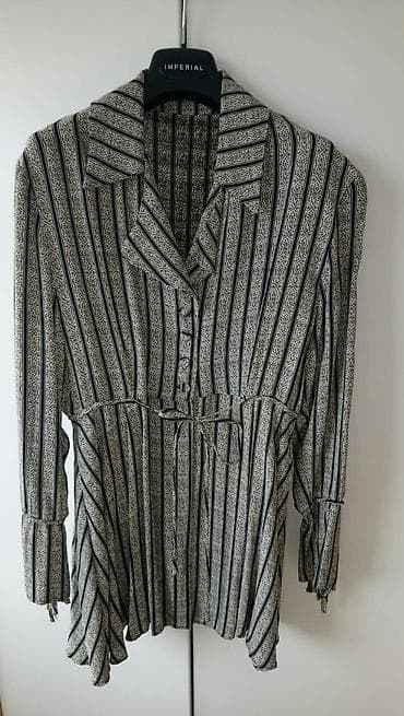 Kosulja do pola se kupca dugmicima posle slobodno pada otvara se vidi at lalafo.rs Kosulja do pola se kupca dugmicima posle slobodno pada otvara se vidi