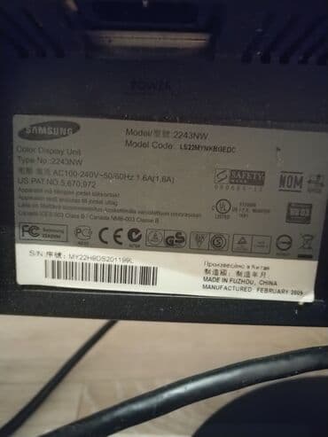 fen za kosu singer: Crni Samsung monitor modela 2243NW, pogodan za svakodnevnu upotrebu — 4