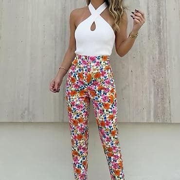 Ženske pantalone sa cvetnim printom – visoki struk
1350 din
S M L