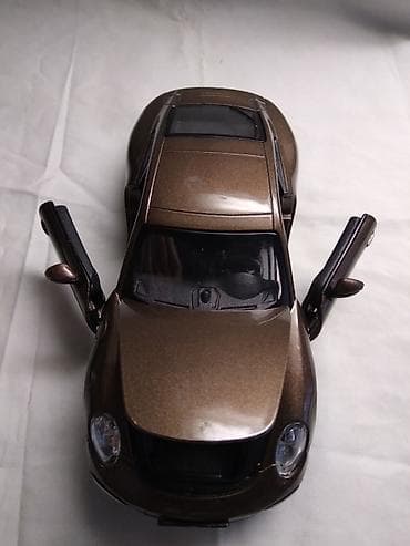 dota torbe: Burago Porsche 911 Carrera S,fale 4(a ne 3) tocka,ostalo ok,China — 2