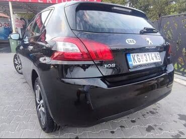 lidl kompresor za vazduh: Crni Peugeot 308, kompaktan automobil pogodan za gradsku vožnju i duža — 2