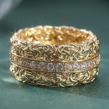 van cleef nakit cena: Zlatni prsten široke burme sa bogatim pletenim motivom i centralnim — 1