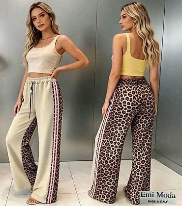 Ženske pantalone.Ravne,lepršave nogavice sa sportskim detaljima sa