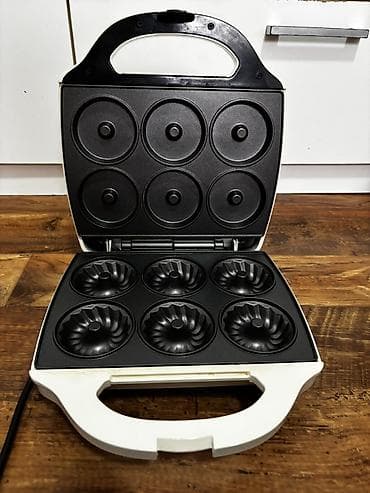 Aparat za mini kuglof kolače je potpuno ispravan i u odlicnom stanju! na lalafo.rs Aparat za mini kuglof kolače je potpuno ispravan i u odlicnom stanju!