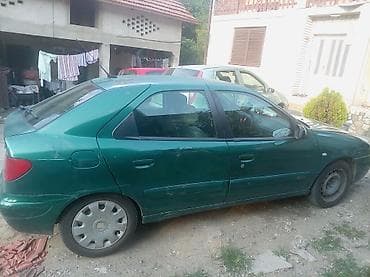 tapacir golf 4: Citroën Xsara – hečbek, zelena boja, 5 vrata. - Motor: benzinski — 3