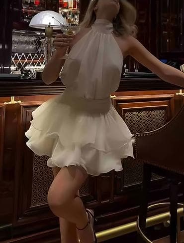 Ženska odeća: 💫Elegantna bela mini haljina bez rukava sa visokim okovratnikom — 2