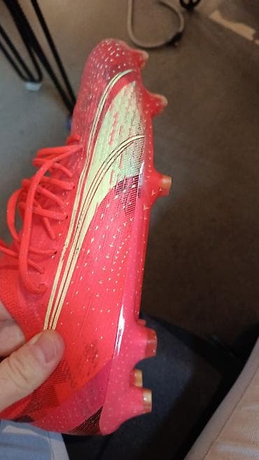 kopačke joma: PUMA ULTRA Ultimate FG/AG kopačke – crveno/koralna boja sa zlatnim — 1
