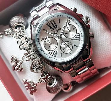 orient satovi: Divan sat u srebrnoj boji, sa brojčanikom prečnika 38 mm.  Materijal — 1