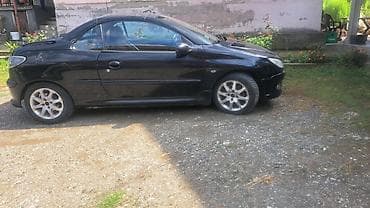 peda gp 50: Peugeot 206 CC kabriolet, crna boja. Tvrdi sklopivi krov — 1