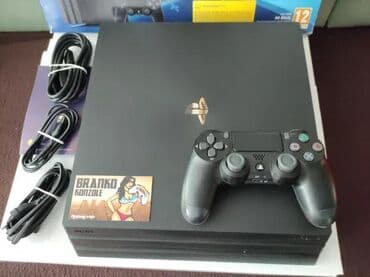 mini klima: **REZERVISANO** Prodajem**Sony Playstation 4 PRO** 1TB konzolu — 3
