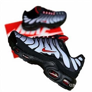 Nike patike – model sa Air tehnologijom u đonu. - Dizajn: crno-belo