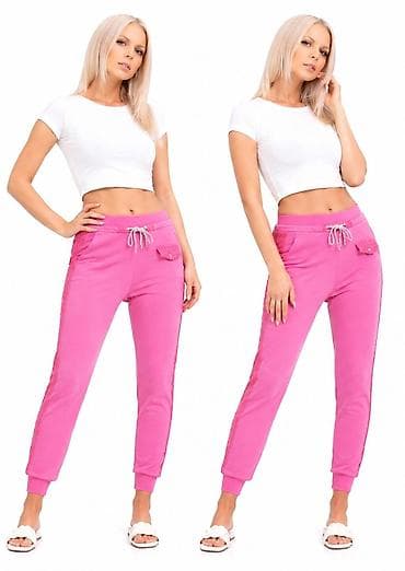 prljavo roza boja: Ženske trenerke – roze - Model: uski kroj sa elasticiranim manžetnama — 4